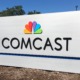 Comcast corporate headquarters logo building signifying Comcast splits into two separate companies